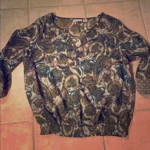 Green/ Teal see-trough shirt.